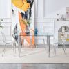 Modern minimalist glass dining table. A transparent tempered glass desktop with a thickness of 0.3 feet and metal legs. Suitable for restaurants and l