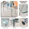 Modern minimalist glass dining table. A transparent tempered glass desktop with a thickness of 0.3 feet and metal legs. Suitable for restaurants and l