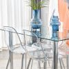 Modern minimalist glass dining table. A transparent tempered glass desktop with a thickness of 0.3 feet and metal legs. Suitable for restaurants and l